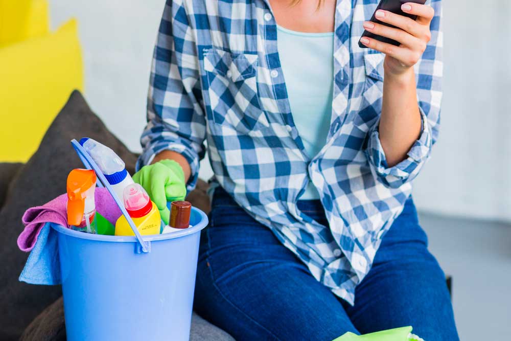 Woman with cleaning bucket