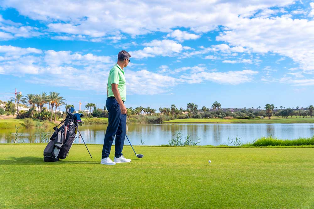 Male golf player on professional golf course