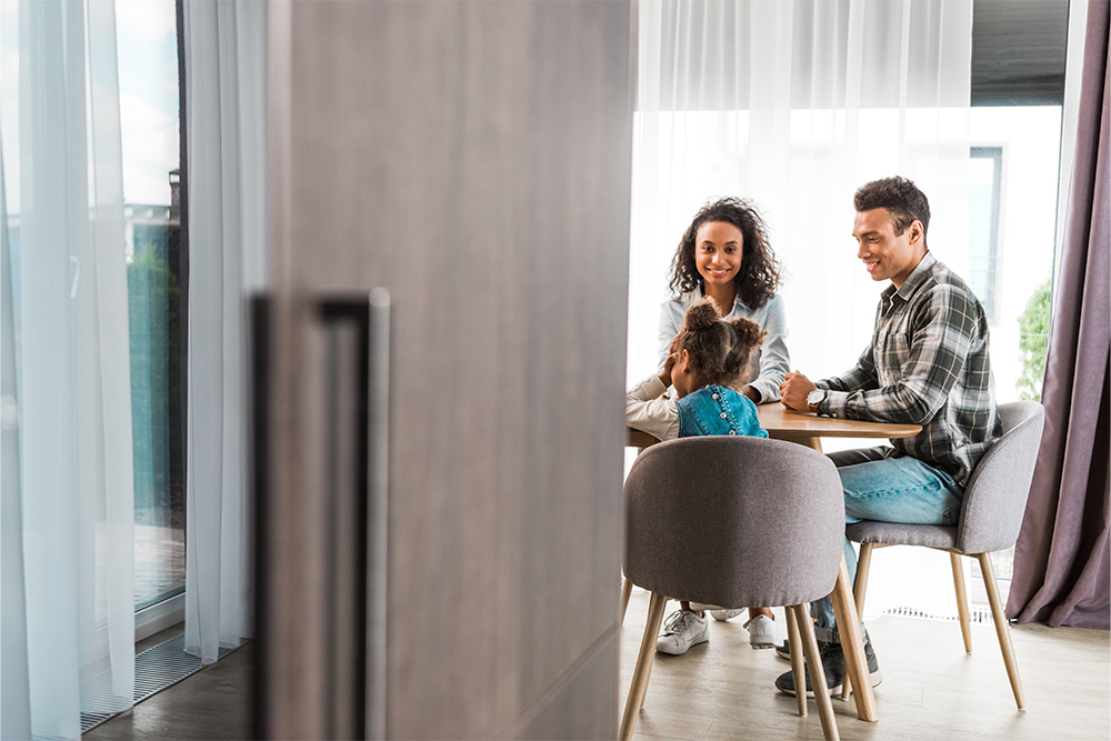 Happy family in an insured apartment in Dubai
