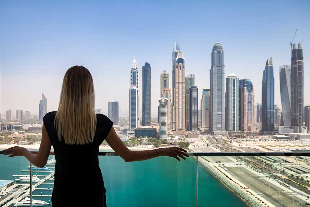 Woman exploring rent to own schemes in Dubai