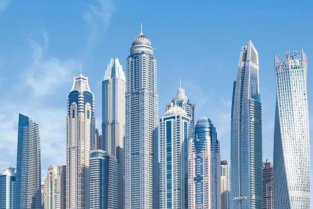 Concrete High-rise Buildings Under Blue Sky 