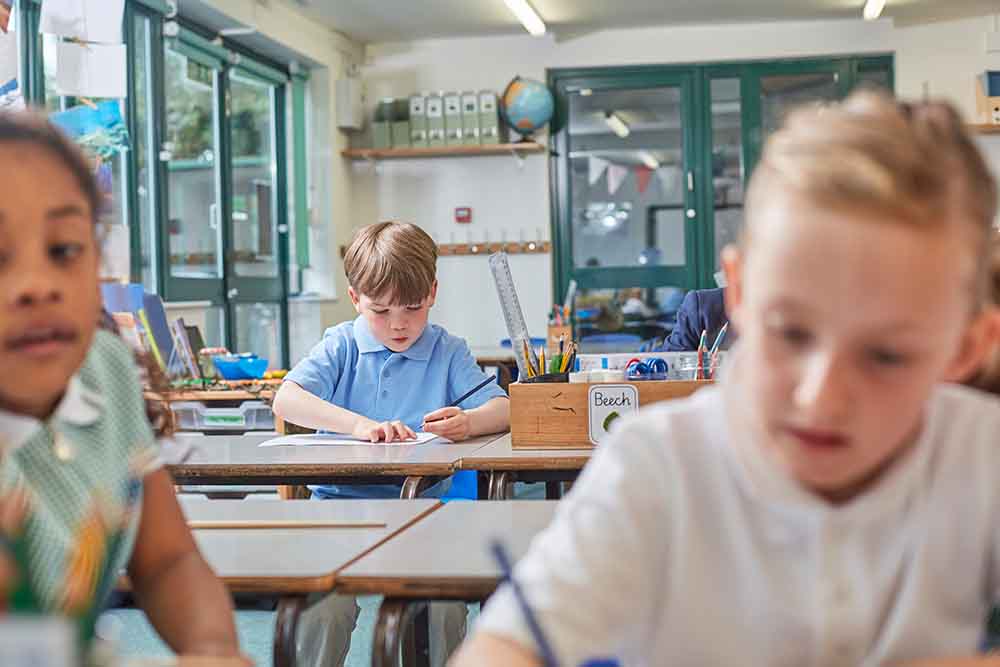 Children doing homework in a british school in Dubai