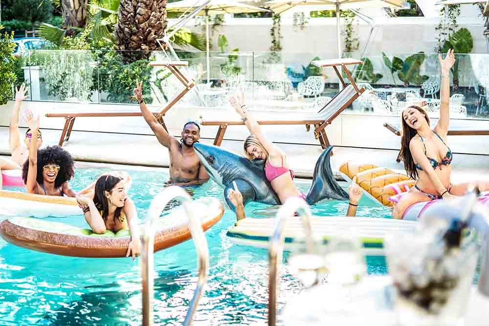 Friends enjoying a private pool in resorts of UAE