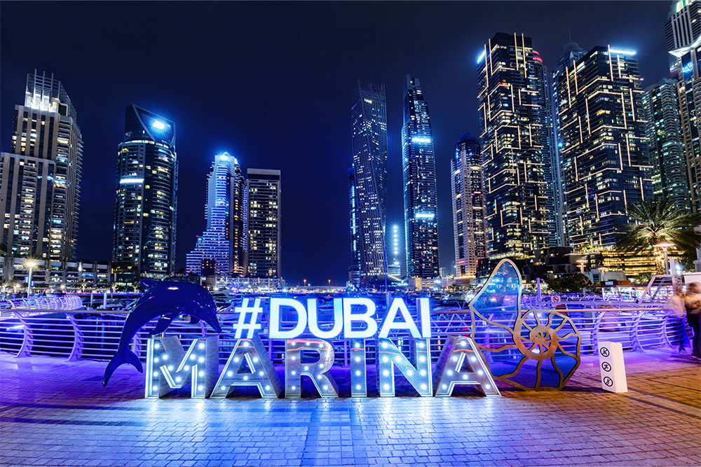 Dubai marina promenade in UAE at night