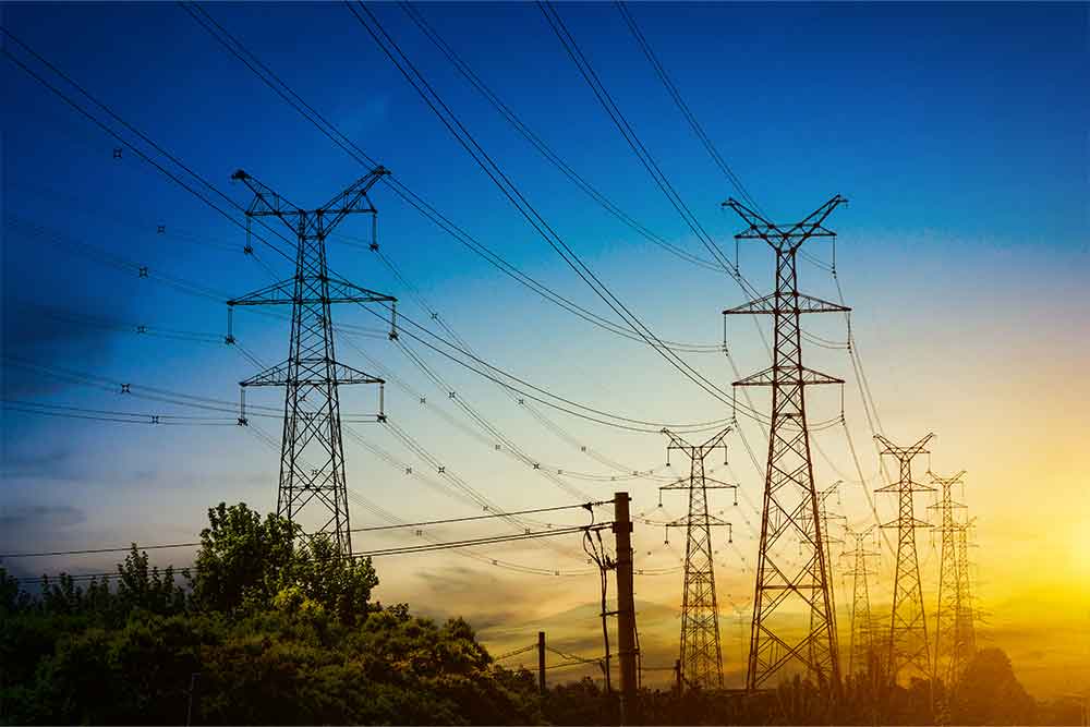 Electric towers under the sunset sky