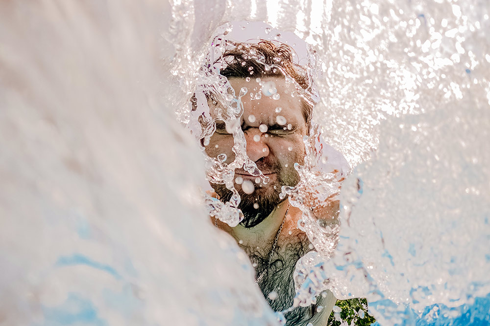 Man having a dip in the pool