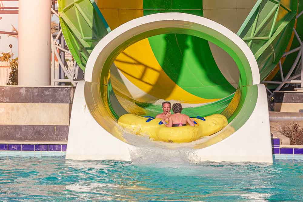 Couple enjoying fun slides