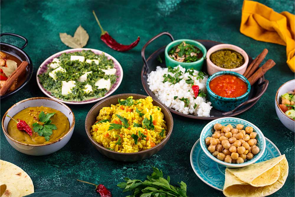 Indian food. Biryani, palak paneer, chapati.