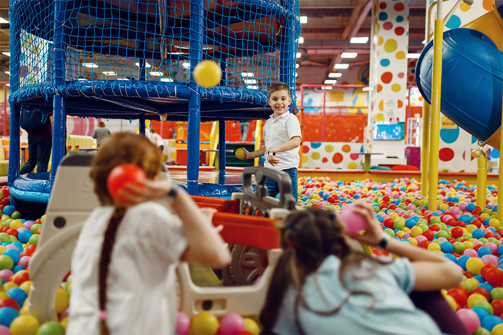 Little girl enjoying in the play area