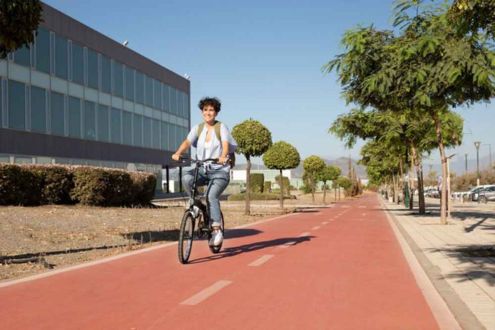 a girl cycling on a dubai track