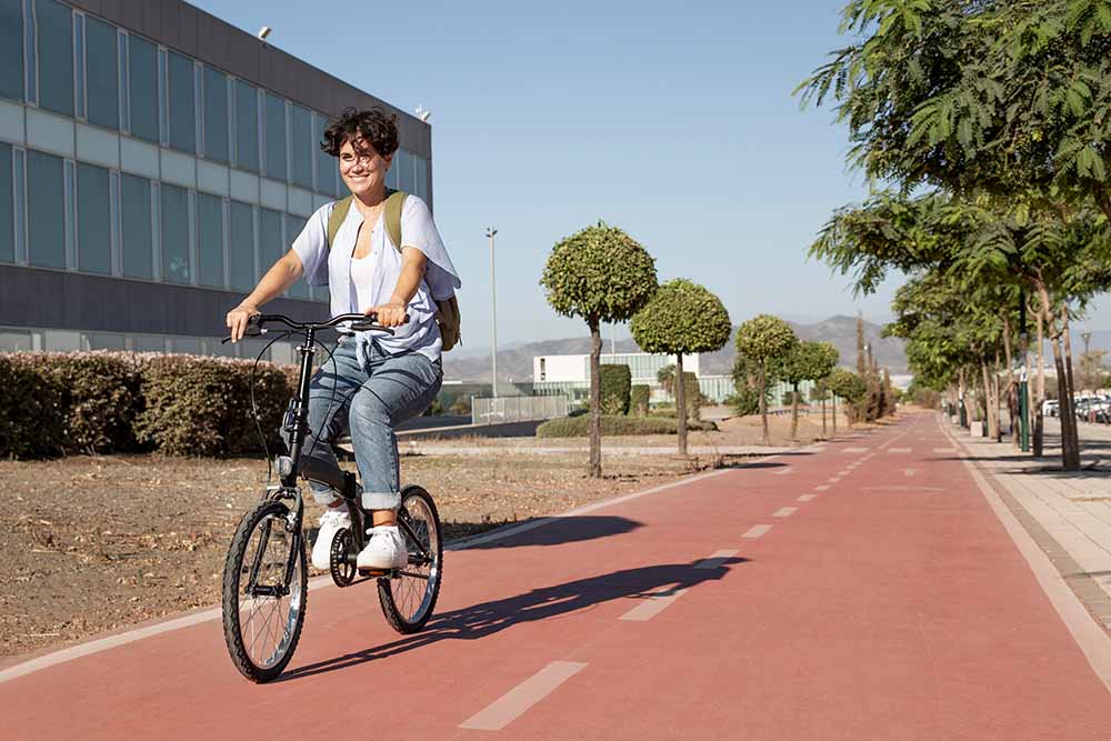 a girl cycling on a dubai track