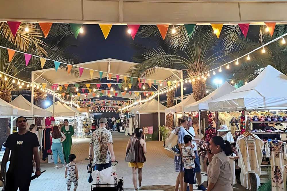 People walking through the streets of The Ripe Market