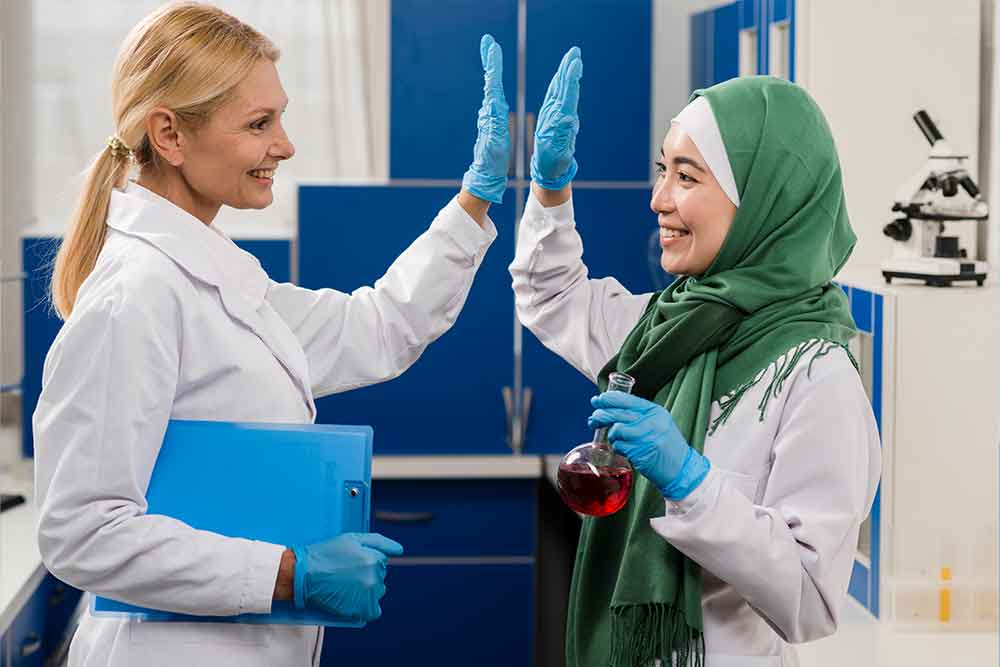 doctors high-five after a successful checkup