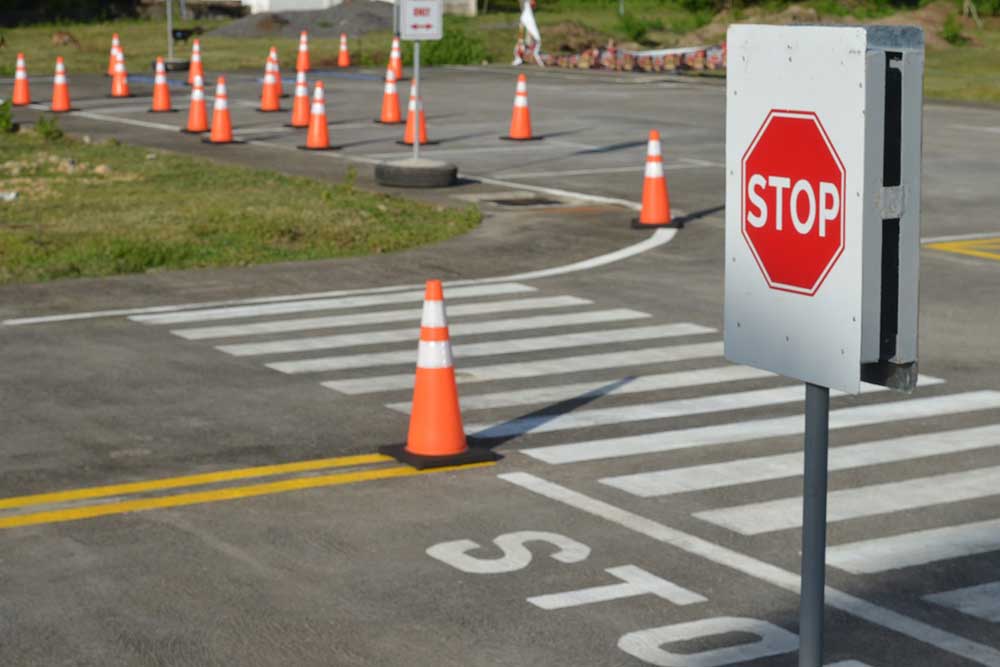 Driving test area with cones and stop sign