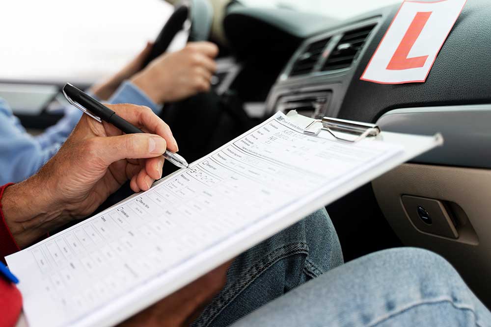 Driving school instructor cross-checking the list