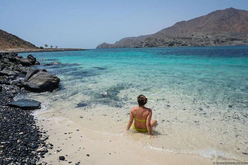 a women relaxing at the beach 