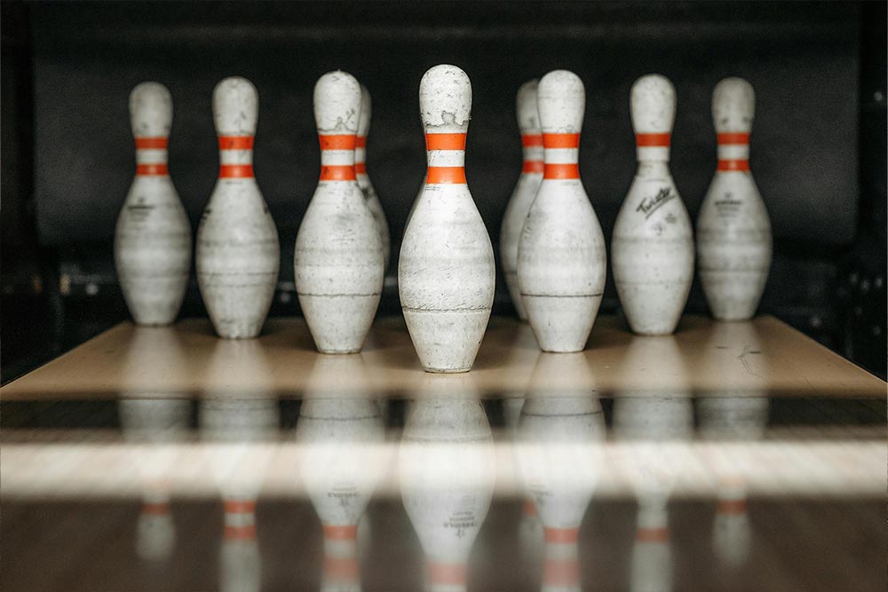 White and Red Bowling Pins