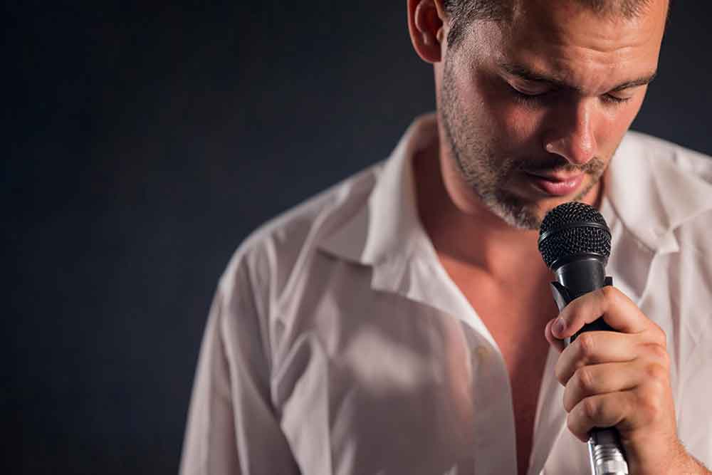 Man singing at karaoke place in dubai