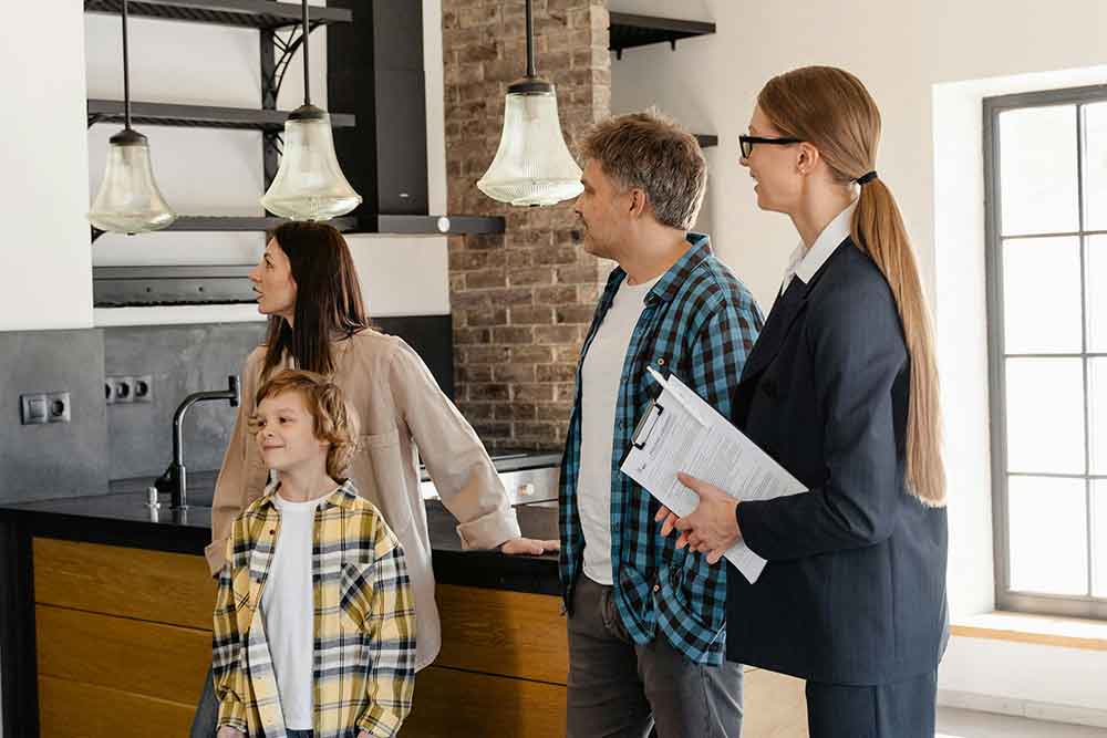 Family surveying a home