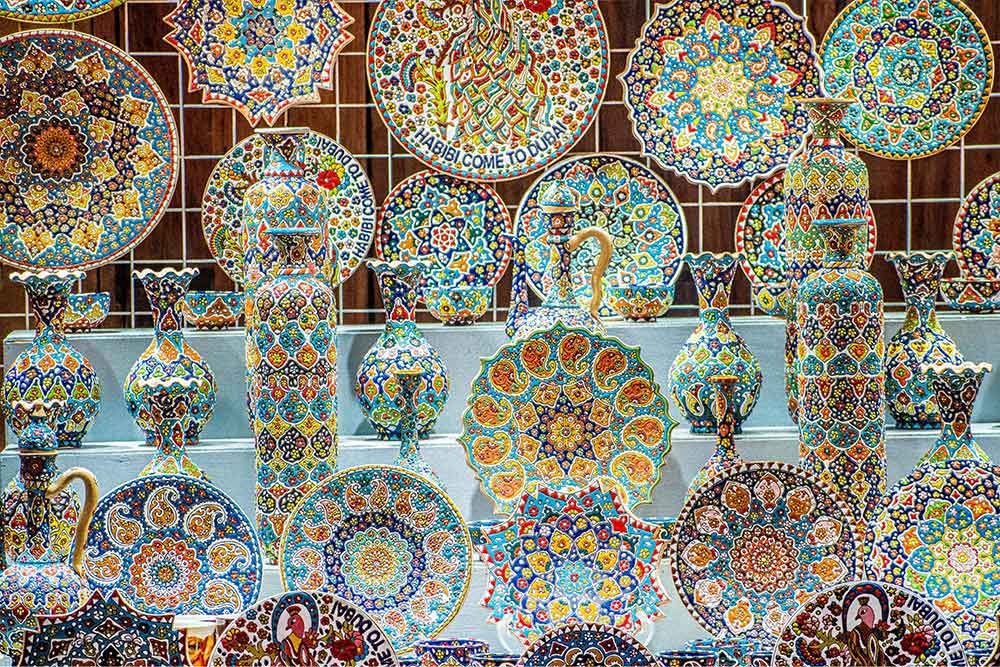 A beautifully designed crockery displayed in a souvenir shop.