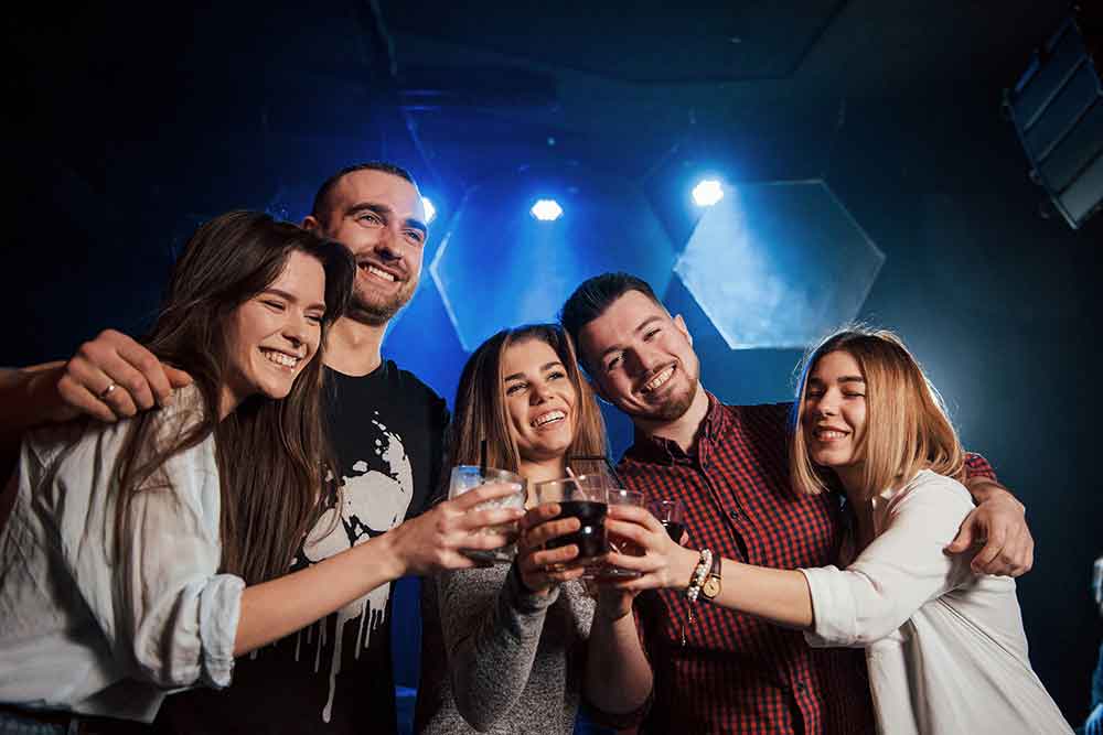 A group of friends enjoying at karaoke spots