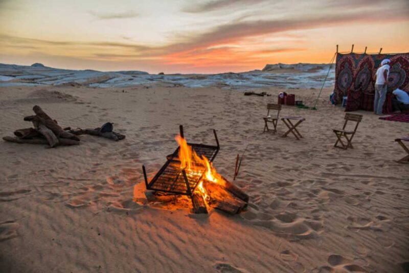 Campfire at a desert campsite during sunset in Ras Al Khaimah. 