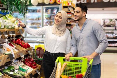 Family doing grocery shopping at Al Maya supermarket