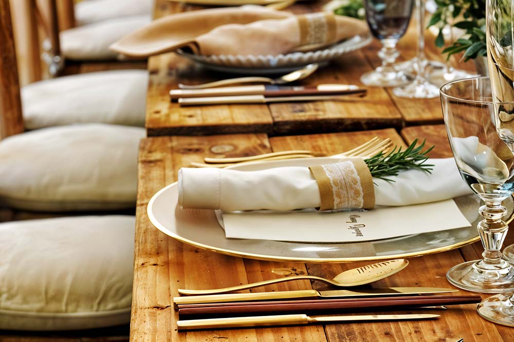 restaurant table with set plats and cutlery 