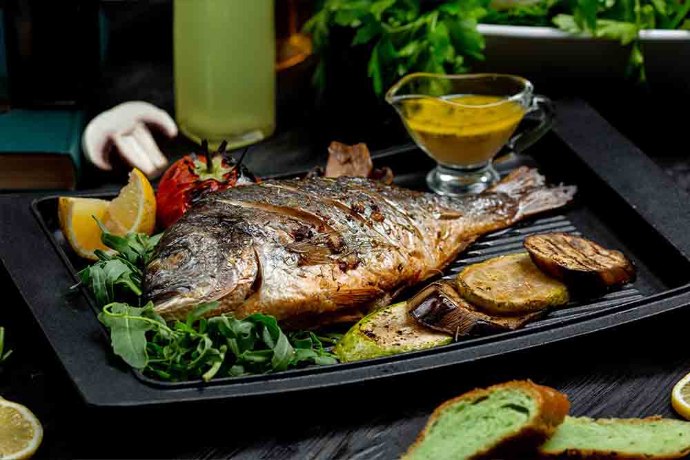 Grilled fish dish at one of Abu Dhabi's best seafood restaurants