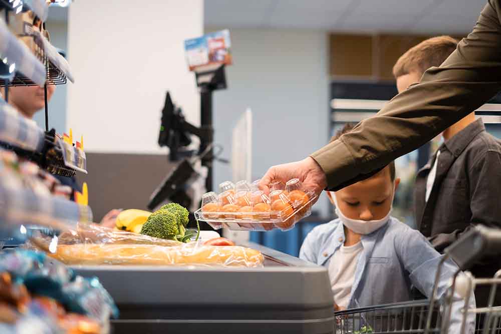 kids helping in buying groceries