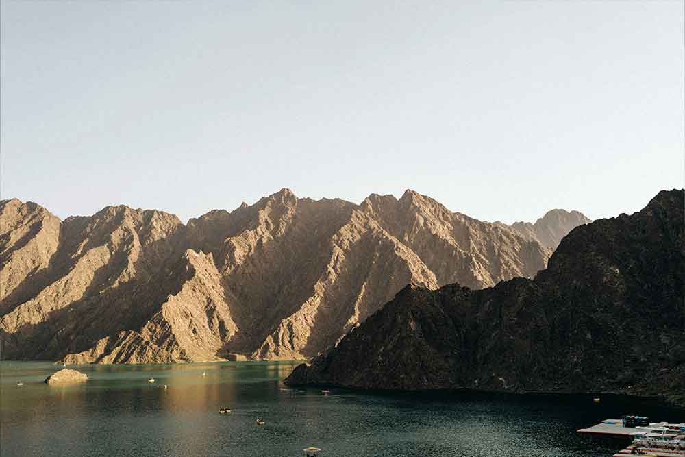 Beautiful wadi nestled within the Hajar Mountains, featuring clear, flowing water 