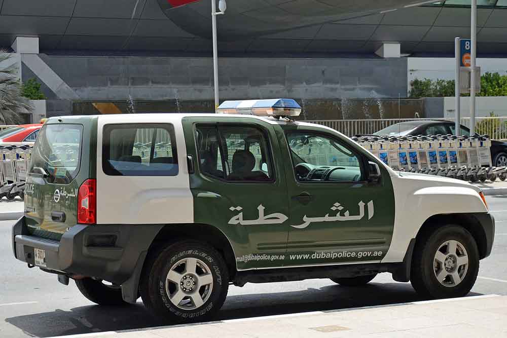 Car parked outside a Smart Police Station in Dubai