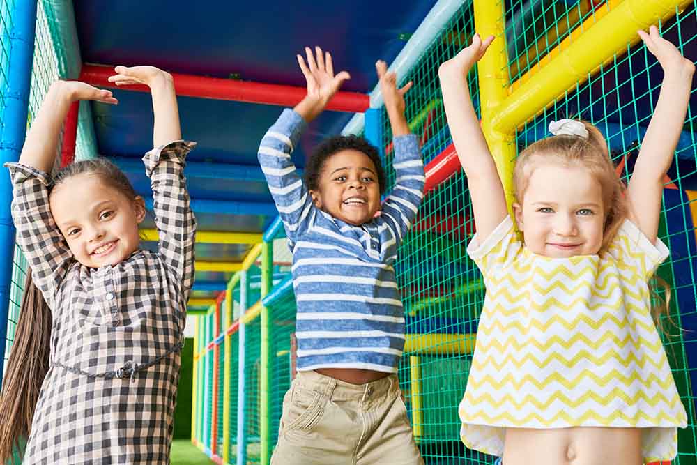 Kids enjoying in indoor play area 