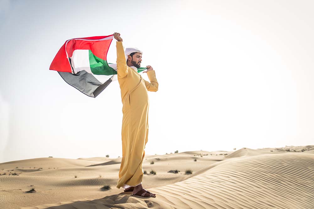 Emirati boasting the UAE flag 