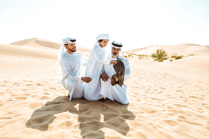 A kid enjoying desert safari activities in Dubai 