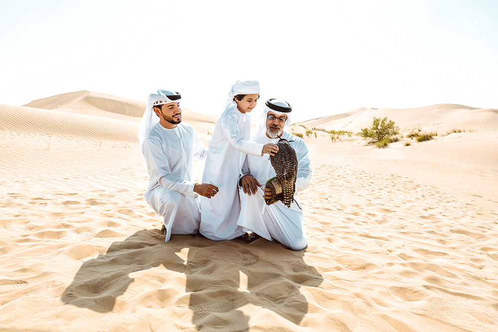 A kid enjoying desert safari activities in Dubai
