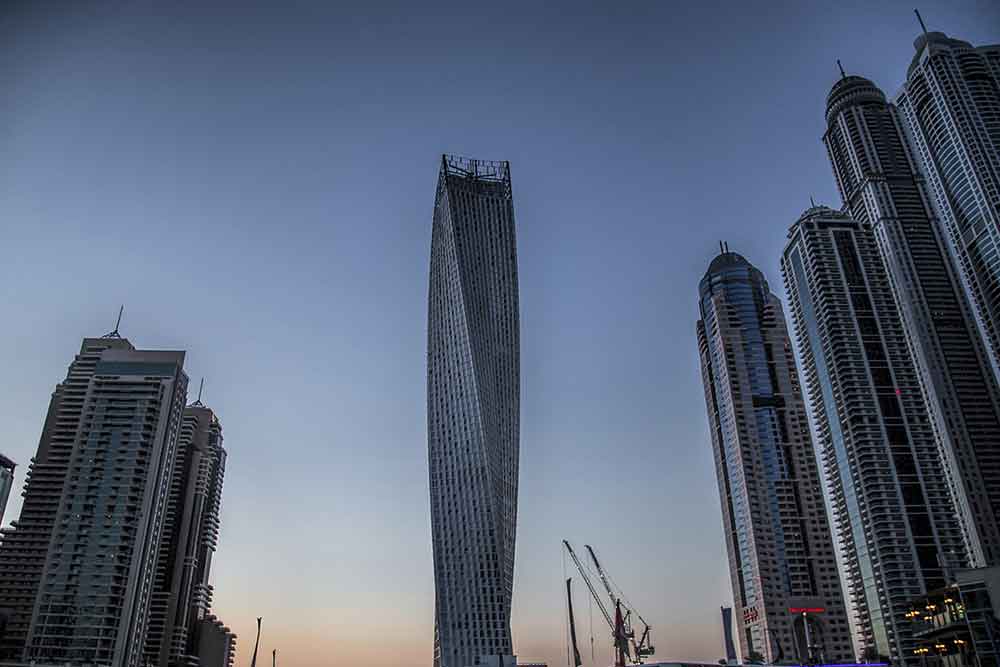 Dubai skyscrapers at dusk, showing UAE building retrofits.