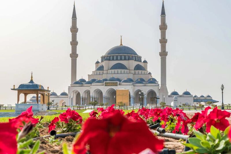 Image of a mosque with blue minarets 