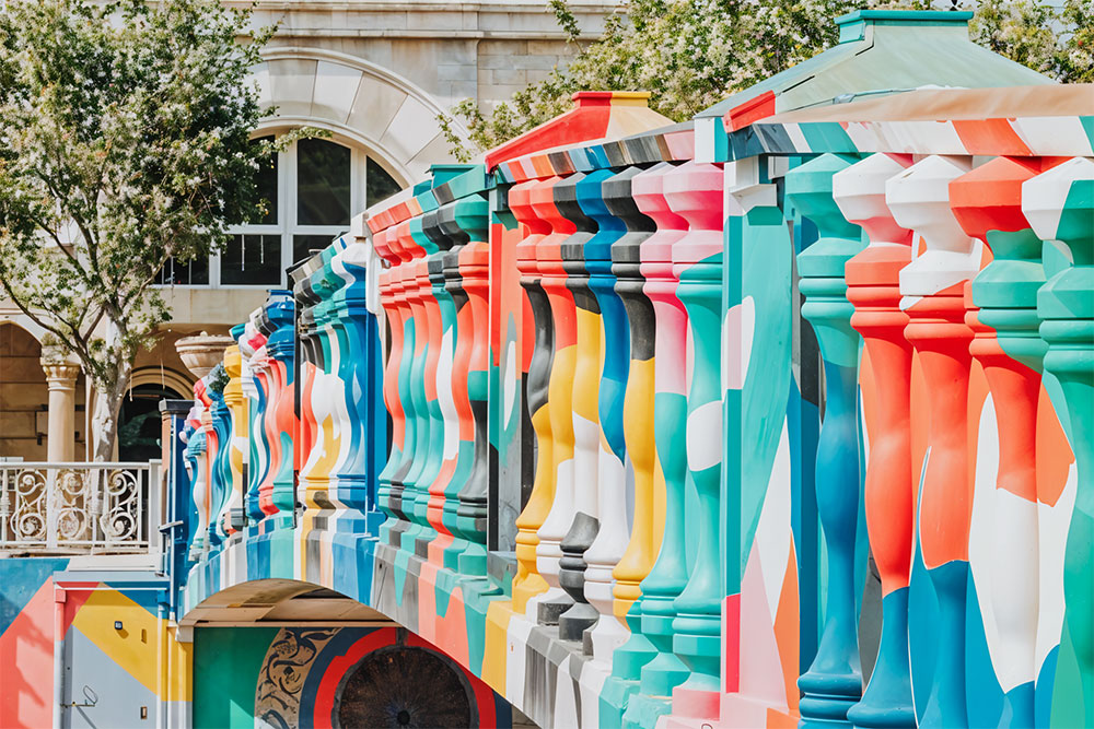 Image of a color walk over a bridge over a canal 