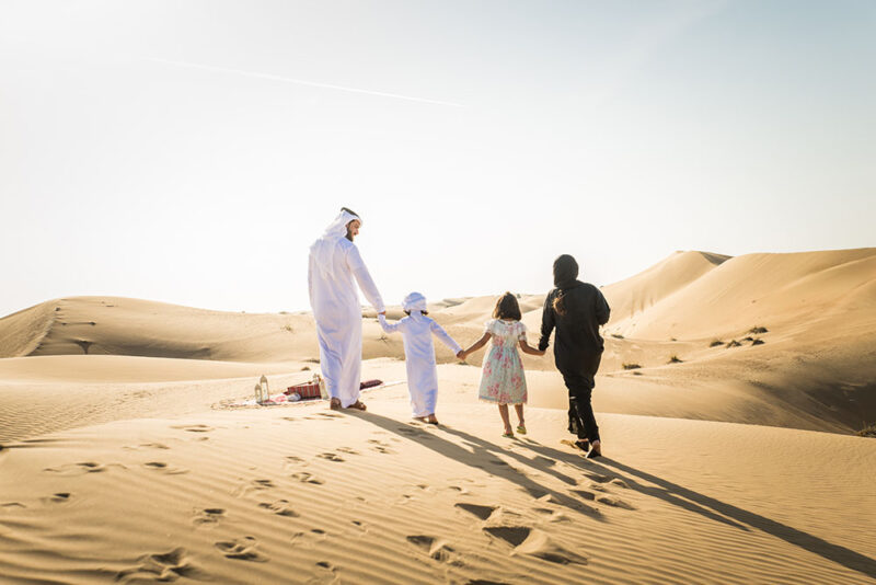 Family enjoying in deserts of Dubai 