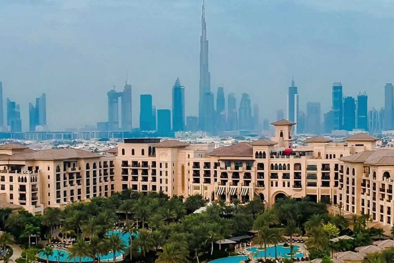 A hotel with Dubai Skyline in the background 