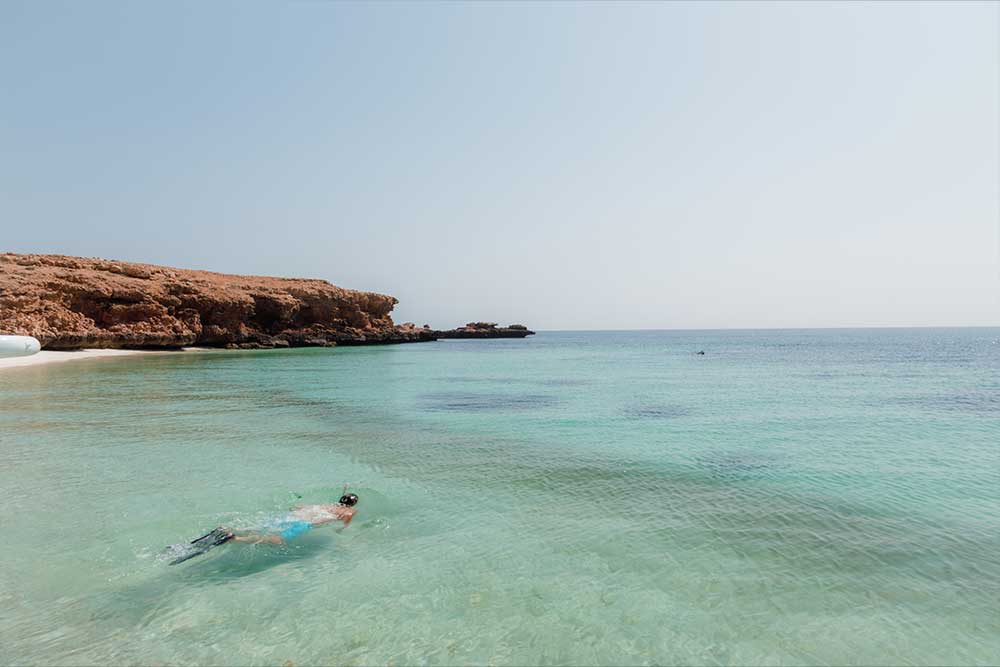  swimming in Hudayriat Island clear water
