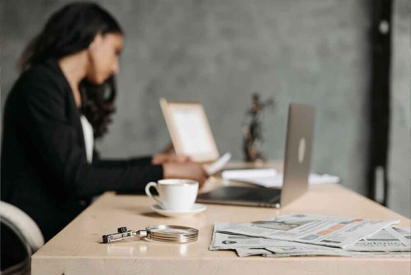 Women working on title deed documentation