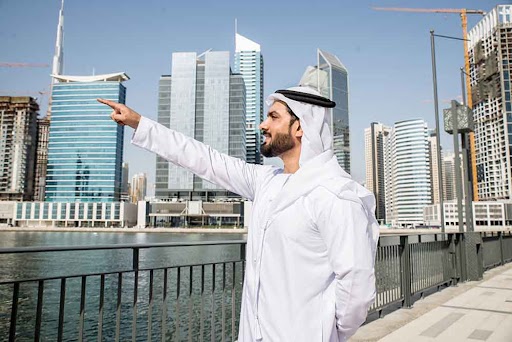 Person pointing out to properties in Dubai