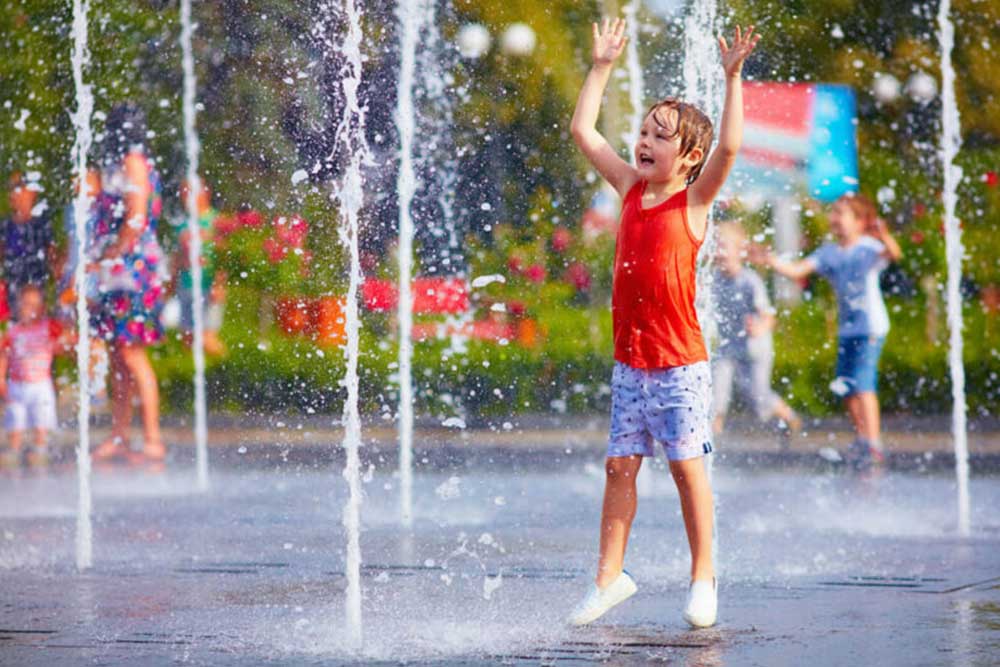 Little boy enjoying some water fun 