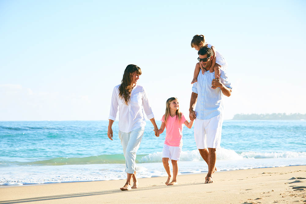 A happy family on the Jumeirah beach