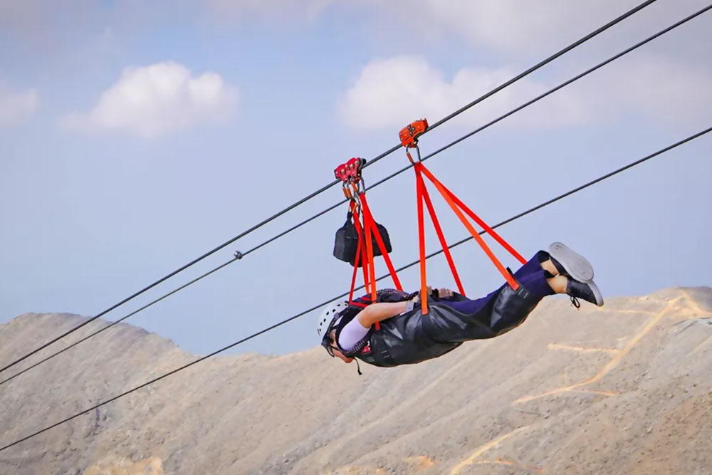  soaring through the sky on the Jebel Jais zipline in RAK