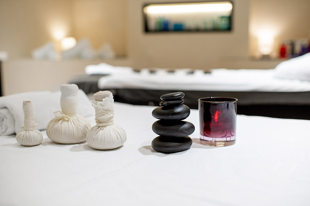 A peaceful room with candle and spa products