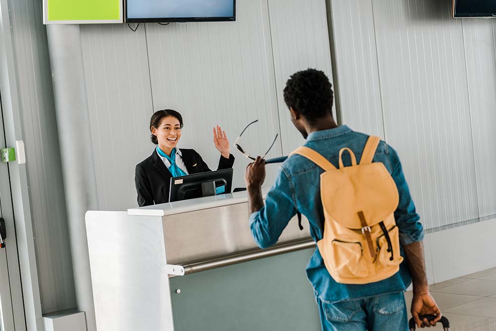  The airport staff welcoming the passengers