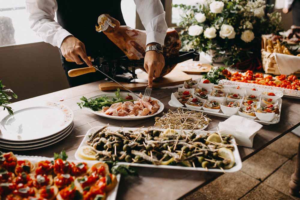 A waiter setting up a table in Lebanese restaurant in Dubai